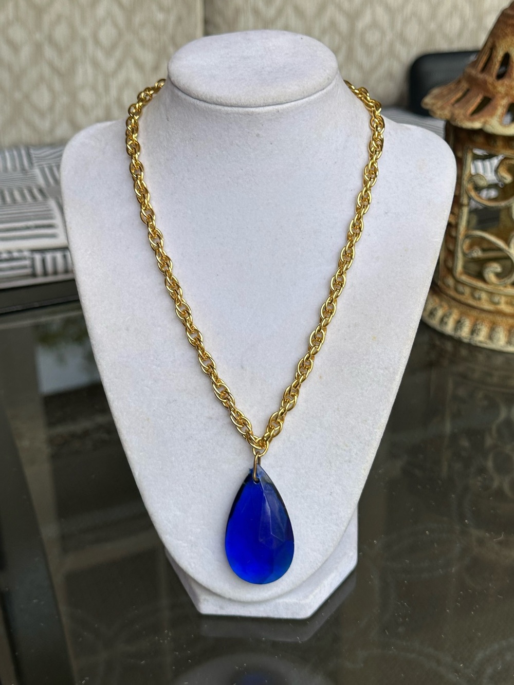 Gold Tone Chain Necklace with Blue Teardrop Pendant